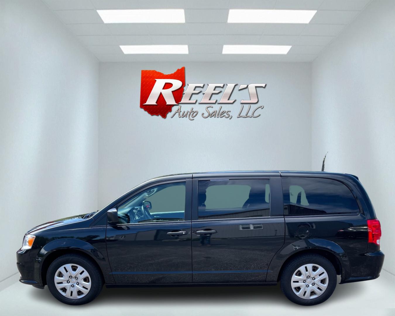 2019 Black /Black Dodge Grand Caravan SE (2C4RDGBG6KR) with an 3.6L V6 DOHC 24V engine, 6A transmission, located at 547 E. Main St., Orwell, OH, 44076, (440) 437-5893, 41.535435, -80.847855 - This 2019 Dodge Grand Caravan SE presents a practical and spacious option for families or travelers needing room for seven passengers. Powered by the robust 3.6L Pentastar V6 engine paired with a 6-speed automatic transmission, it delivers a smooth and reliable driving experience. This model boasts - Photo#8